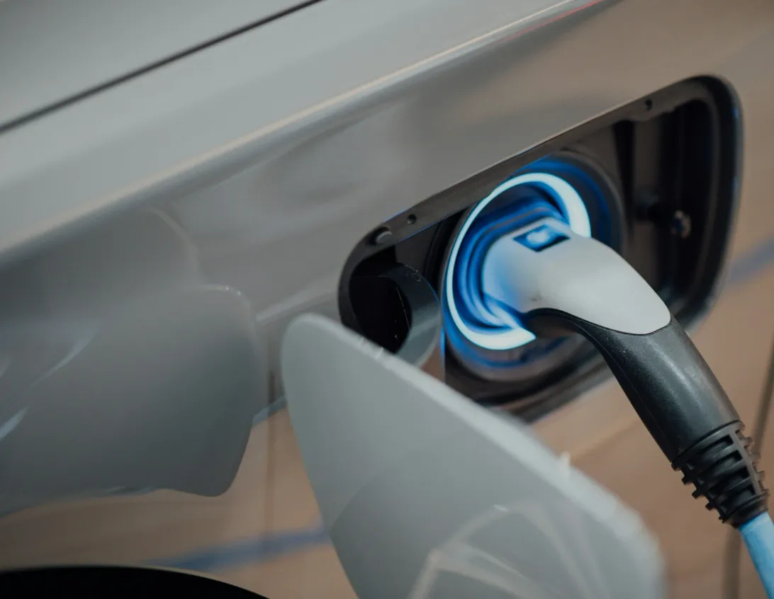 A charging plug connected to an electric car